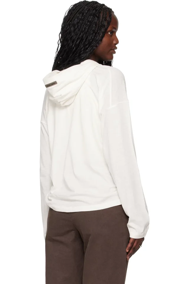 Fear of God ESSENTIALS Off-White Holiday Embroidered Classic Fit Long Sleeve Hoodie, photo 3 of 4 from SSENSE