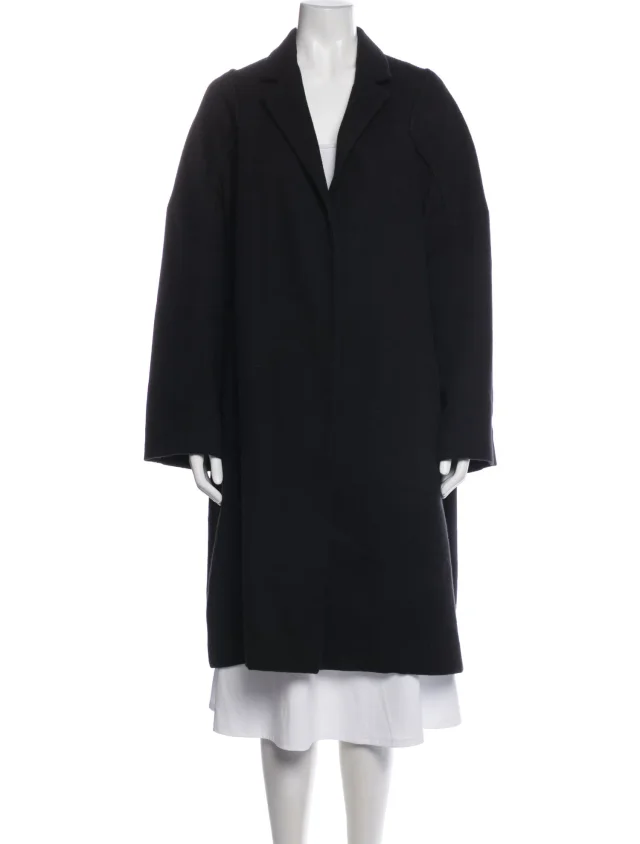 The Row coats in black from The RealReal