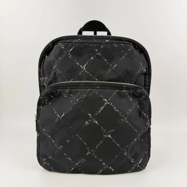 Chanel New Travel Line Backpack Nylon Black Vintage in Black Nylon from The Reluxe