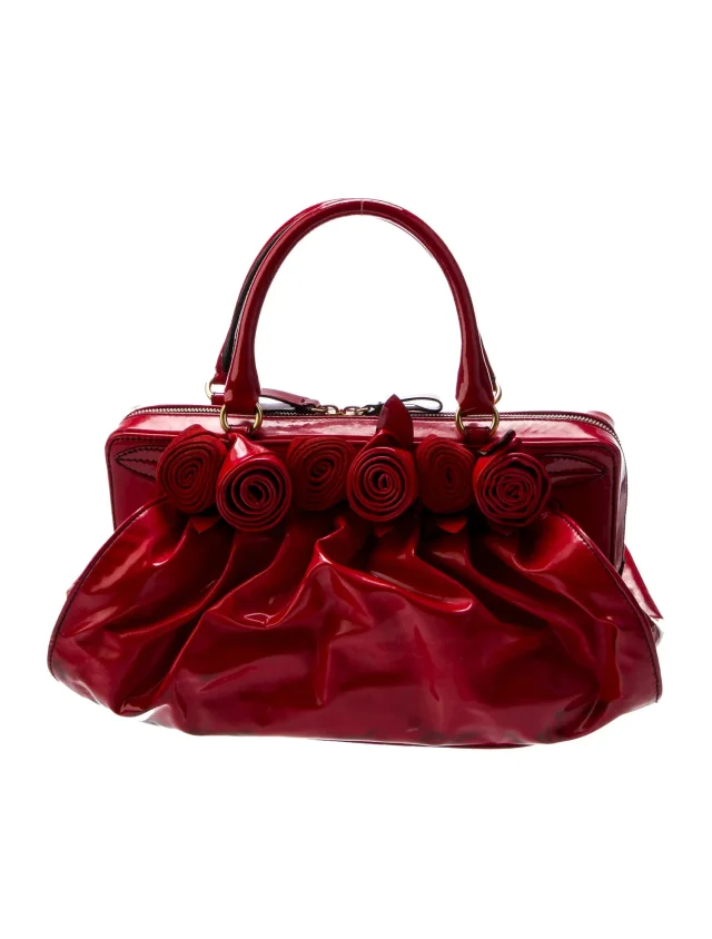 Valentino Garavani Top Handle Other bag in Red Patent leather from The RealReal