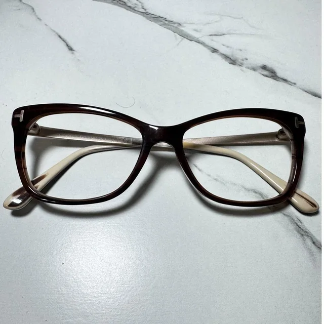 Tom Ford Women's Cat eye Sunglasses - Brown/Gold in gold|brown|red from Depop, photo 1 of 1