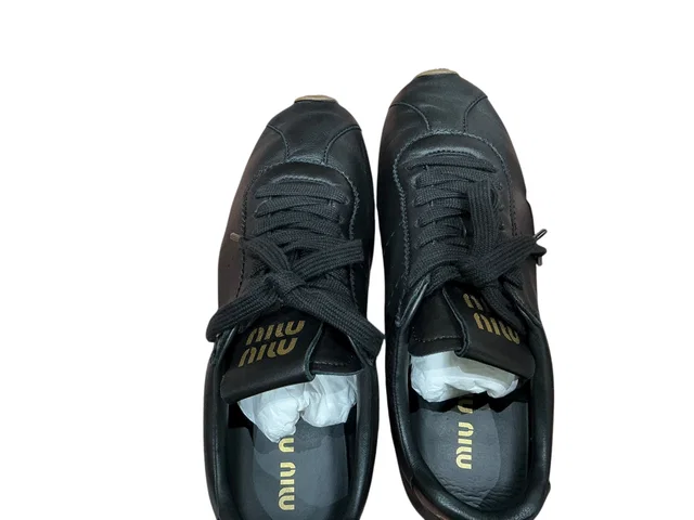 Miu Miu Plume Leather Sneakers in Black #38.5 in Black Leather from Luxury Promise