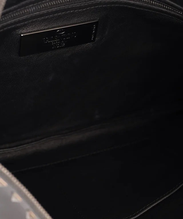 Valentino Garavani Rockstud Leather Pouch Clutch in Leather from Luxury Promise, photo 10 of 11