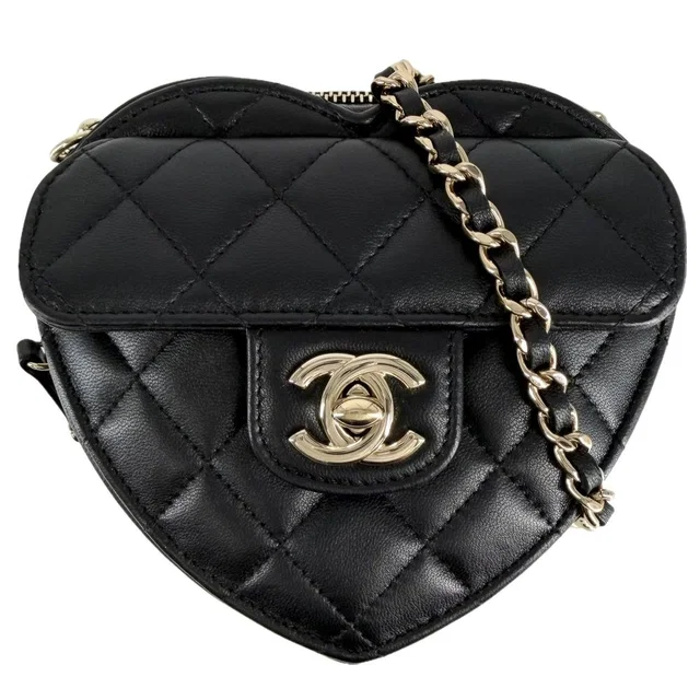Chanel Shoulder Bag Crossbody Mini Chain Bag Quilted Pochette Heart CC Logo in Caviar leather from The Reluxe