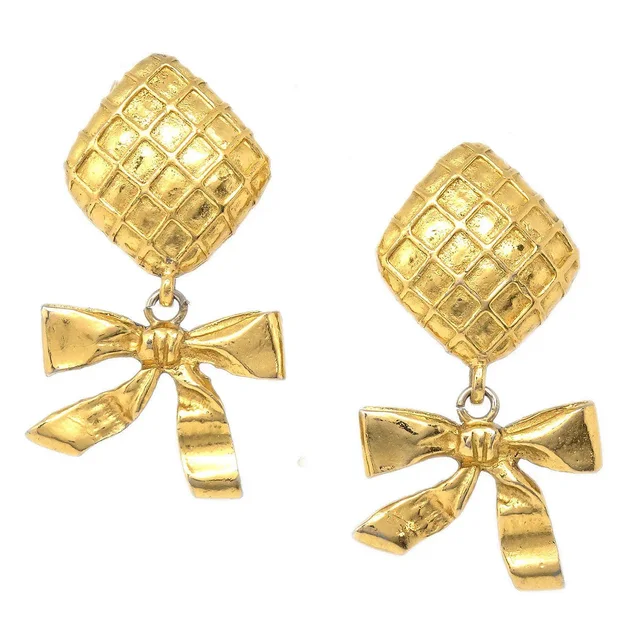 Chanel 1980s Dangle Bow Earrings Gold Clip-On in Gold from AMORE Vintage Tokyo