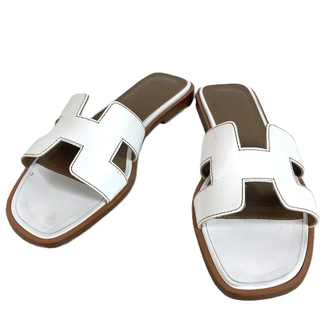 Hermès Sandals Oran Logo Leather White in White Leather from The Reluxe