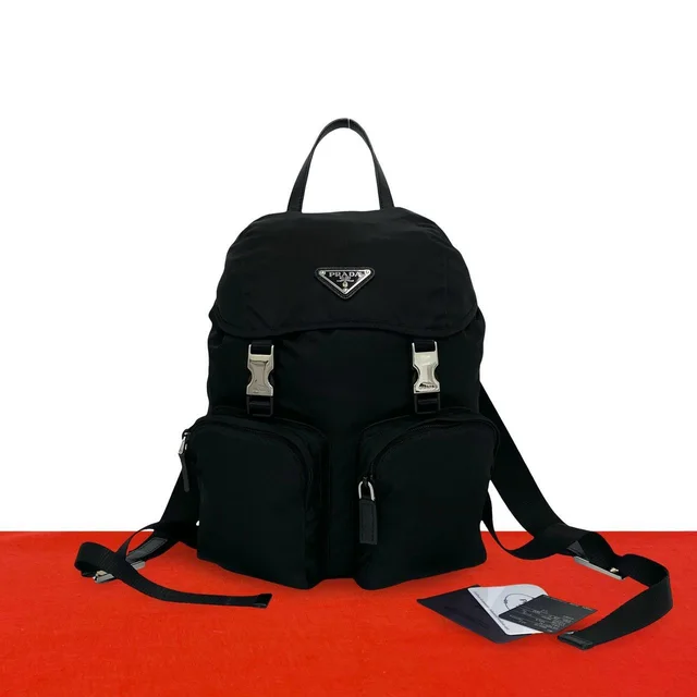 Prada Triangle Logo Tessuto Pocono Nylon Saffiano Leather Backpack Black in Black Saffiano leather from The Reluxe