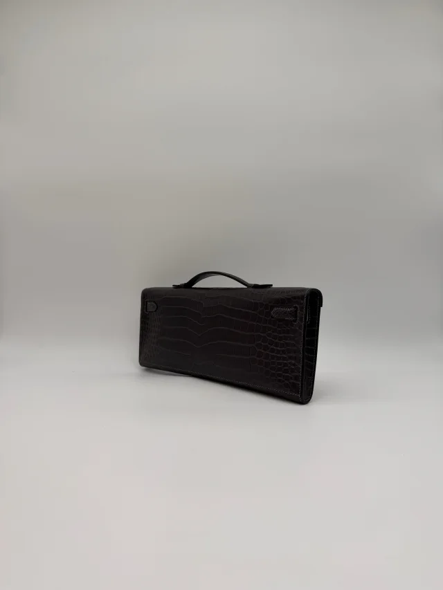Hermès Kelly Cut Graphite Matt Porosus Permabrass Hardware in Grey Leather from Luxury Promise, photo 9 of 11