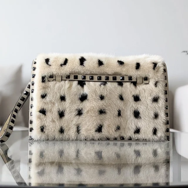 Valentino Garavani Mink Fur Rockstud Clutch in blue from Poshmark