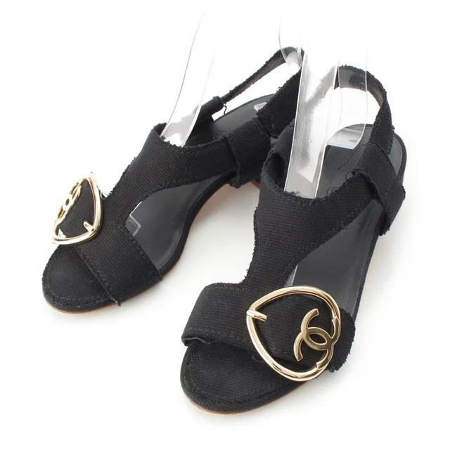 Chanel CC Logo Heart Sandals Black in Black Canvas from The Reluxe
