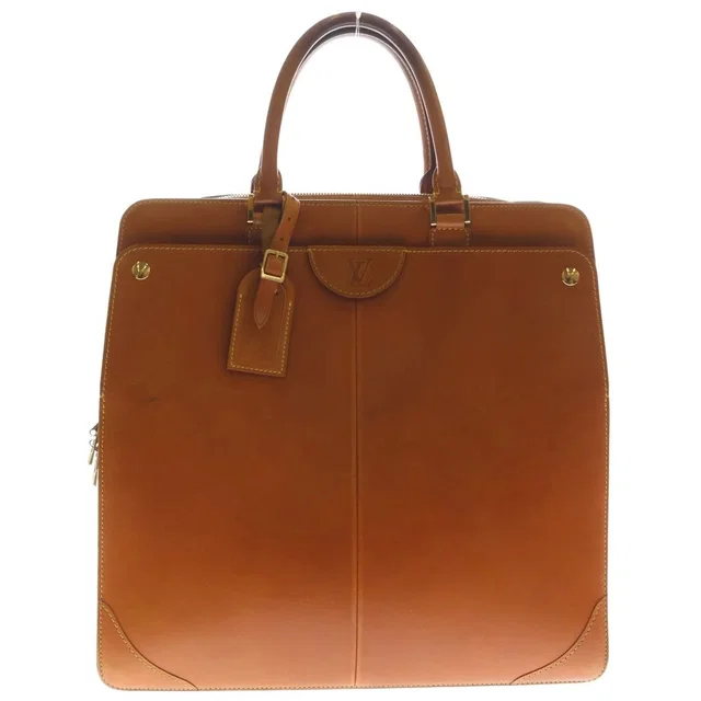 Louis Vuitton Nomad Negev PM Leather Handbag Brown in Brown Leather from The Reluxe