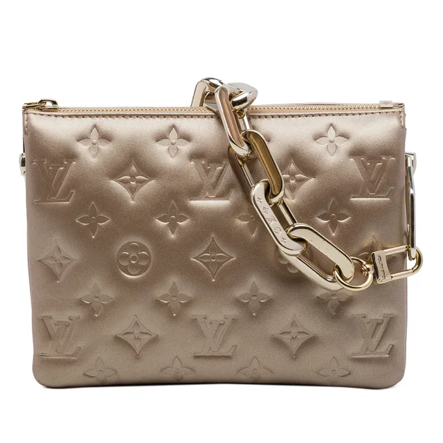 Gold Louis Vuitton Monogram Embossed Puffy Lambskin Coussin BB Satchel in Gold Lambskin from Designer Revival, photo 1 of 1