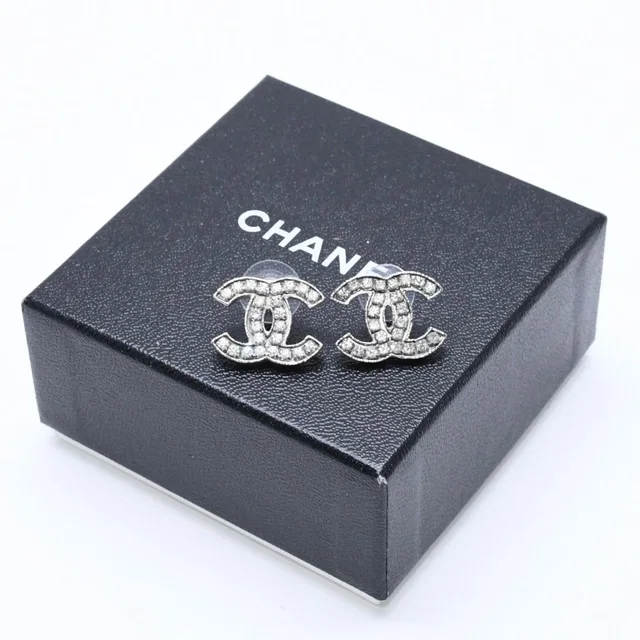 Chanel CC Logo Earrings 08A Stamp Metal Rhinestone Silver in Silver from The Reluxe