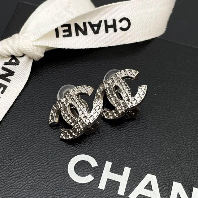 Chanel 00A CC Logo Earrings Silver Icon Coco in Silver from The Reluxe