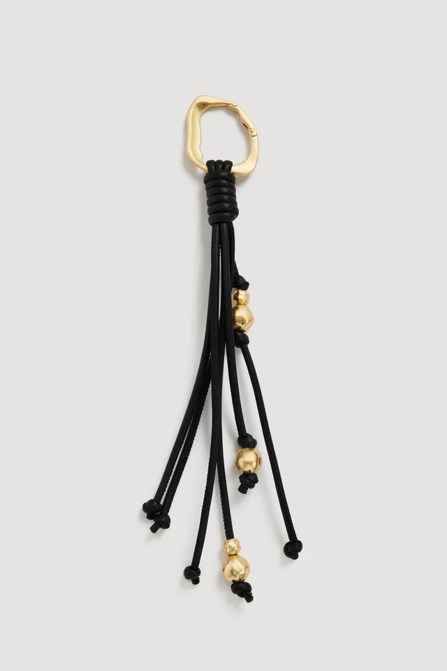 AJE Lucille Key Charm in Black from Aje, photo 1 of 1