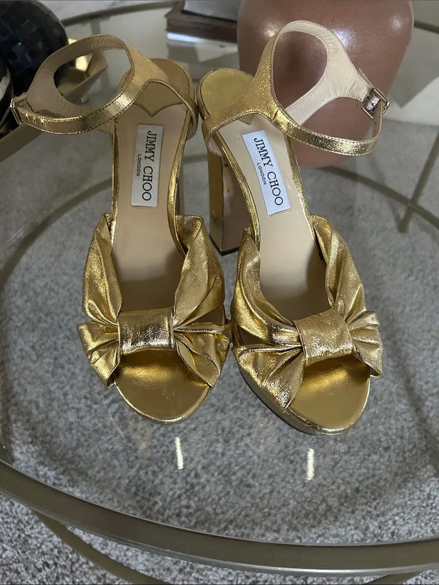 Jimmy Choo Metallic Gold Bow Block-Heel Sandals in gold Leather from Poshmark