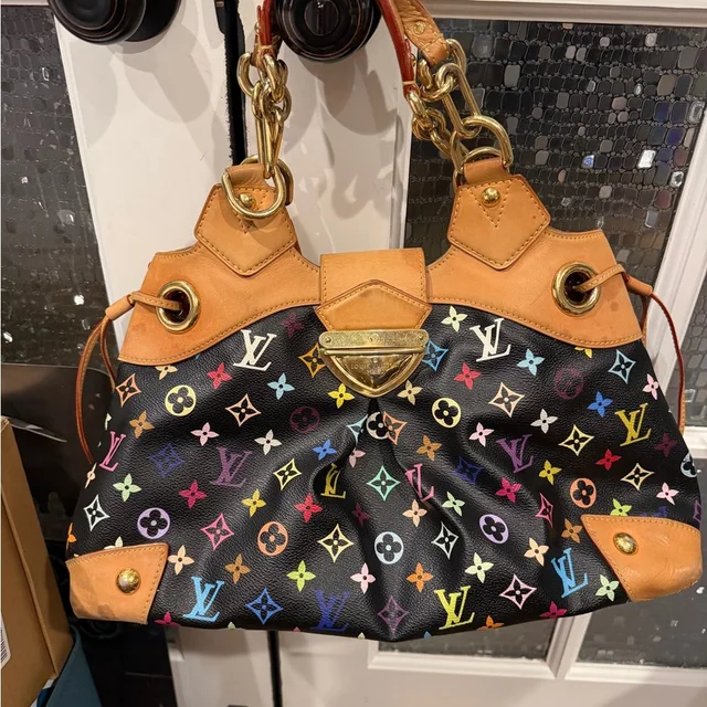 Louis Vuitton Ursula Black Murakami Shoulder Bag in black|brown|neutral Leather from Poshmark, photo 1 of 1
