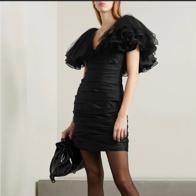 Khaite Carmen Tulle Dress in black from Poshmark