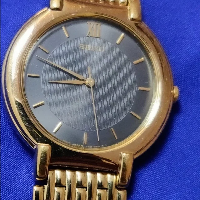 Seiko Vintage Classic Gold Tone Men's Watch V791-1761 in gold from Poshmark