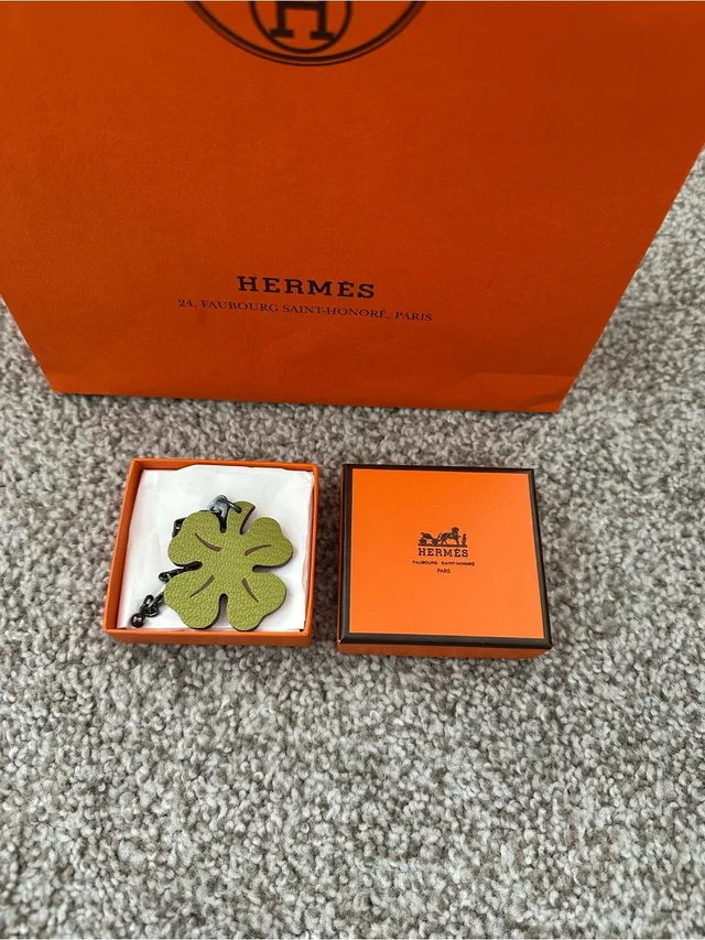 Hermès Orange Leather Clover Pendant Charm. Authentic in orange|brown|red Leather from Poshmark, photo 6 of 7