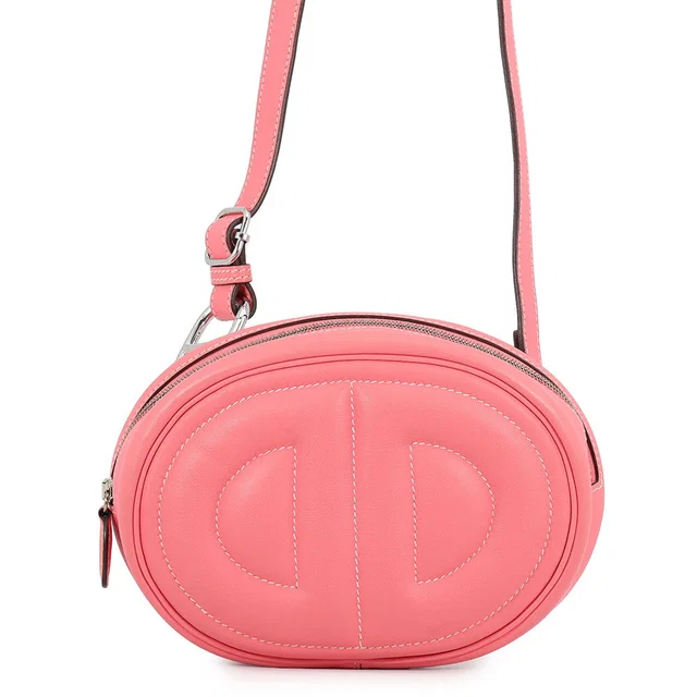 Hermès In the Loop Verso Belt Bag Roseete/Terre Battue Swift Leather in Swift leather from GALLERY RARE
