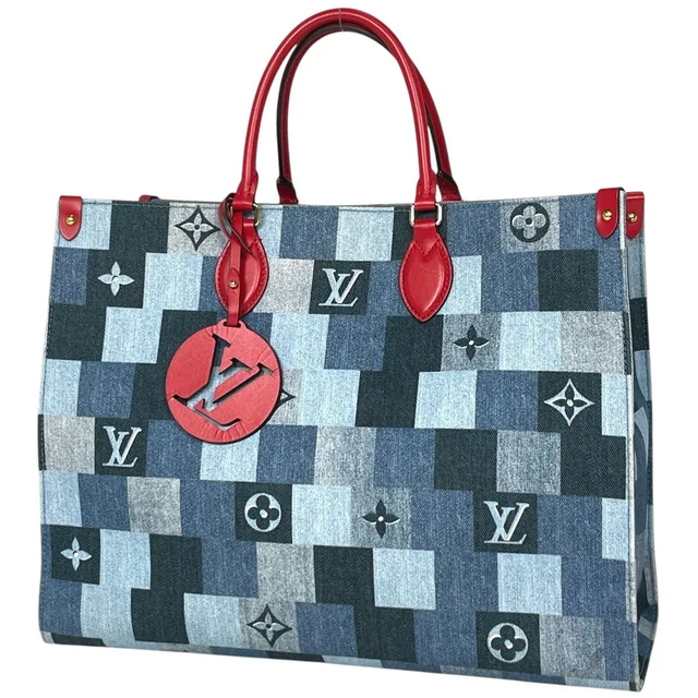 Louis Vuitton On The Go GM Handbag 2-Way Monogram Denim Blue in Blue Denim from The Reluxe