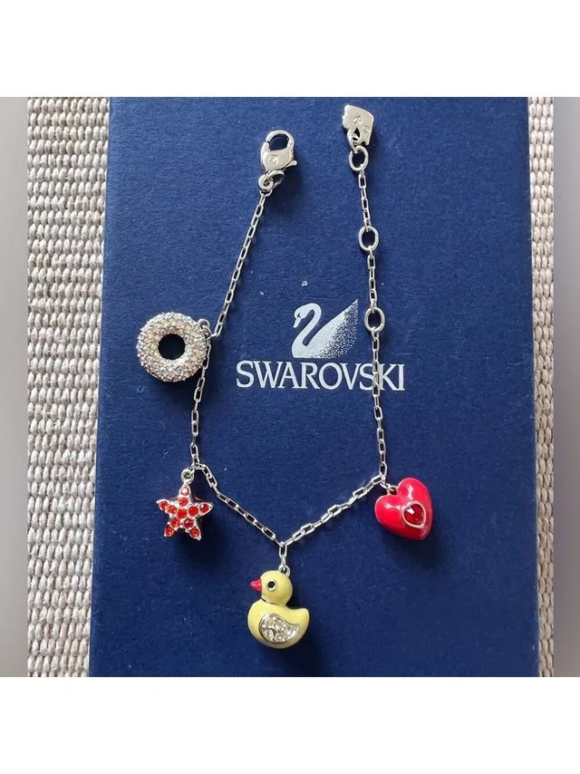 Swarovski Multi Charm Bracelet W Rubber Duck Heart Star Beach Crystals Rare in yellow|silver|gray from Poshmark, photo 1 of 1