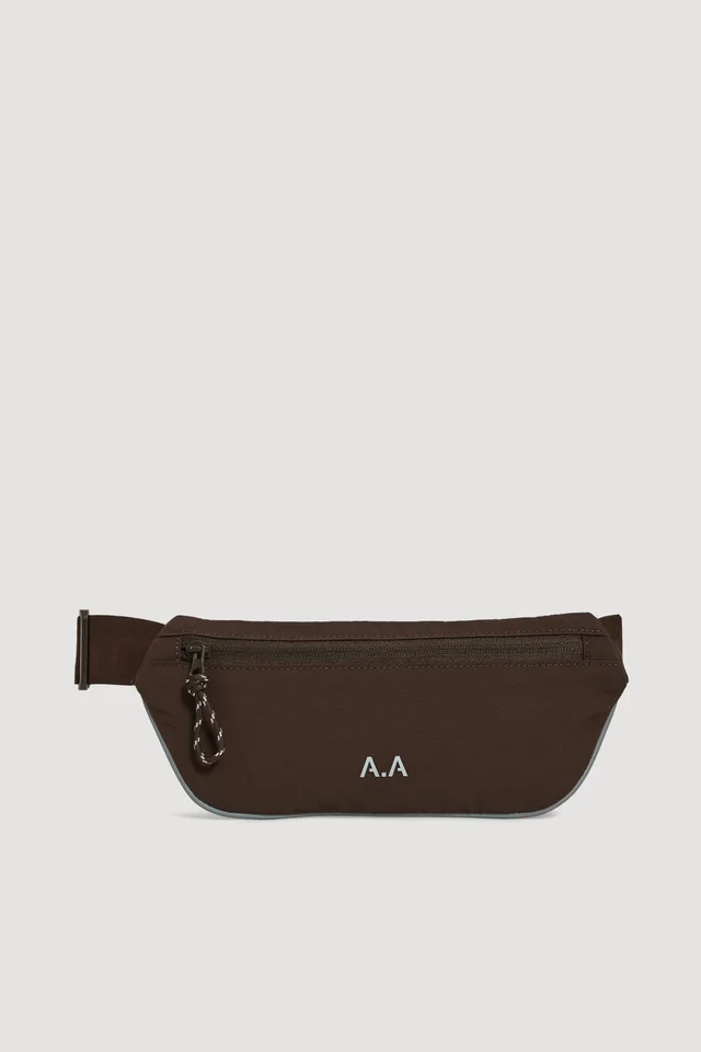 Athletica Agora Running Belt in Brown from Aje, photo 1 of 1