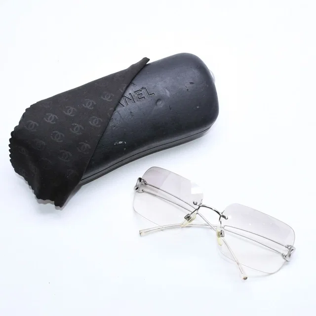 Chanel Rimless Sunglasses Side CC Logo Clear Silver Frame Metal 16 Eyewear in Silver from The Reluxe