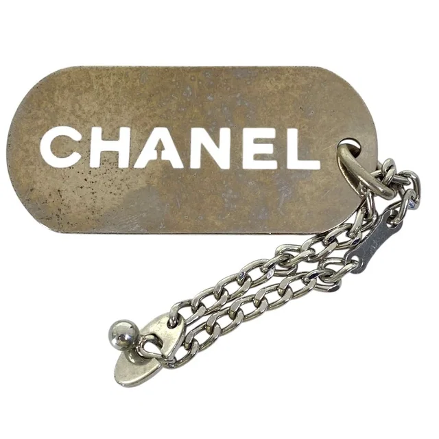 Chanel Logo Plate Charm Key Holder Key Chain Silver Dog Tag Bag Accent Portable in Silver from The Reluxe