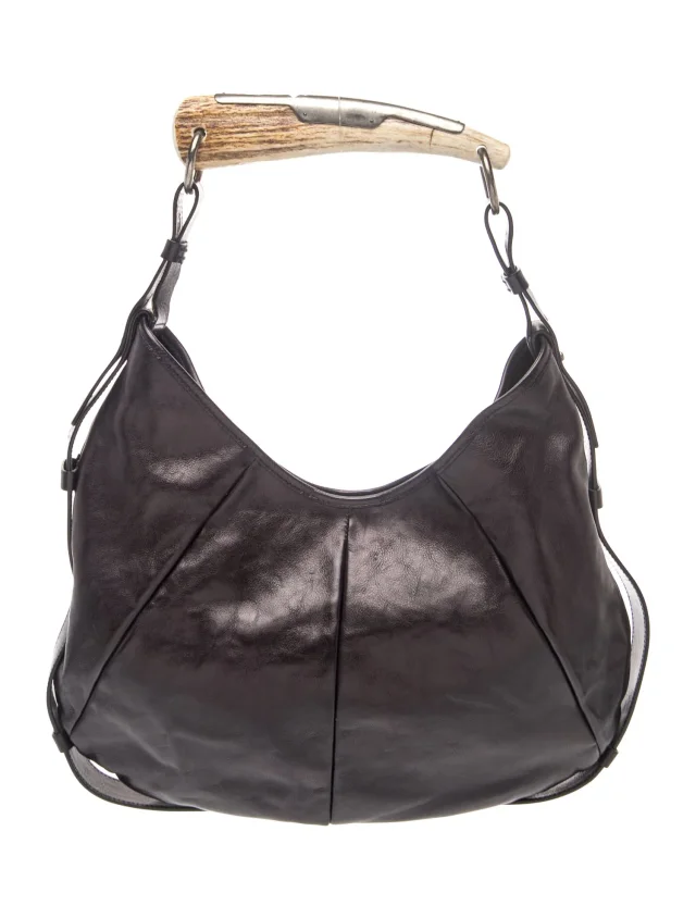Rive Gauche Leather Saint Laurent Mombasa Vintage in purple Leather from The RealReal