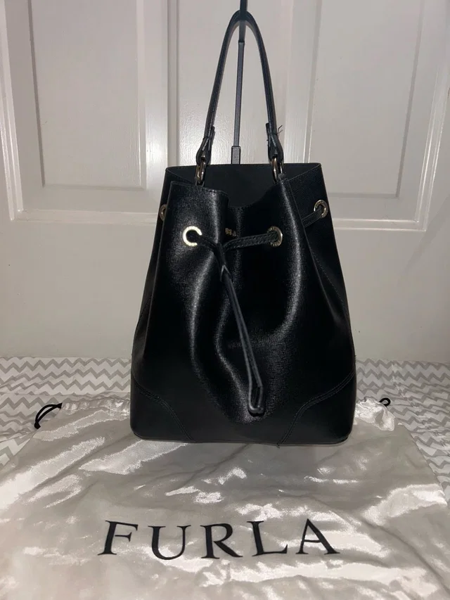 Furla Leather Drawstring Tote in black Leather from Poshmark