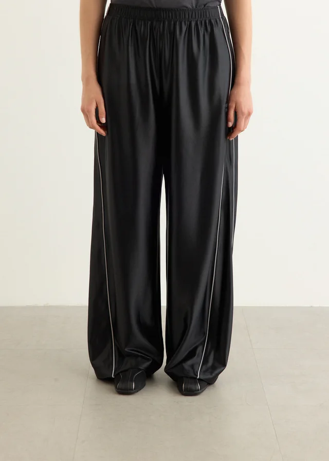 Alexander Wang Mid-Rise Trackpants With Reflective Piping in Black from Incu, photo 1 of 1