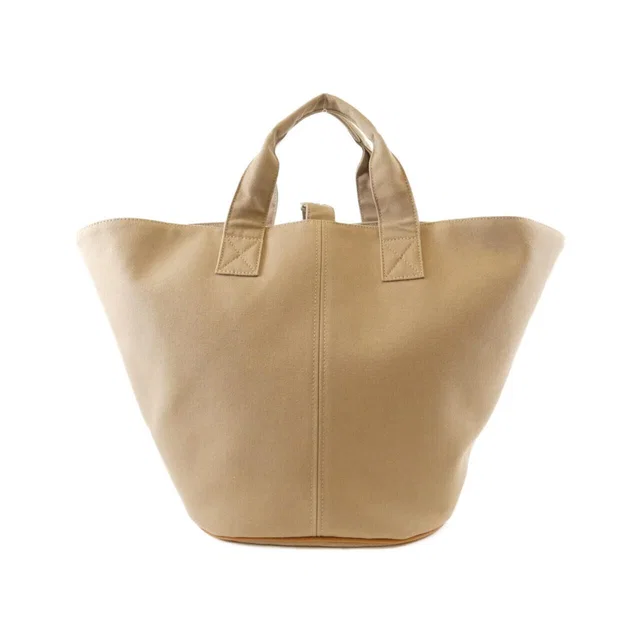 Hermès Pannier de Plage PM Bag in Canvas from The Reluxe