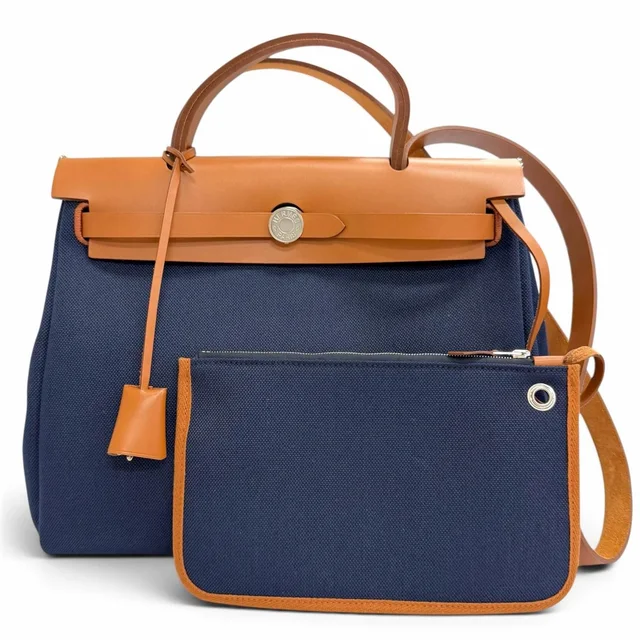 Hermès Herbag Zip 31 PM Toile Hunter Blue Marine Silver 2-Way Handbag in Navy from The Reluxe