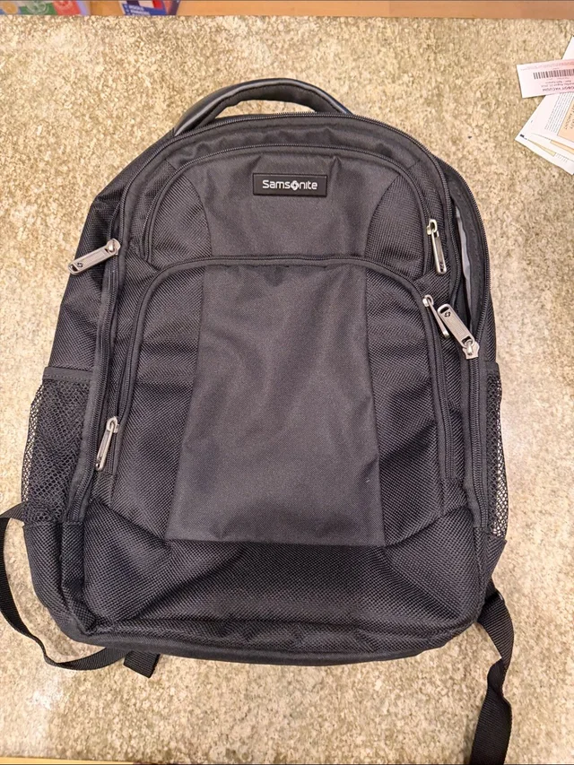 Samsonite Laptop Backpack With Multiple Zip Compartments in black from Poshmark
