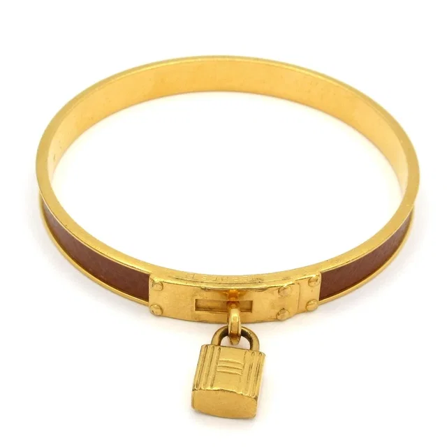 Hermès Bangle Kelly Leather Gold Brown in Brown Leather from The Reluxe