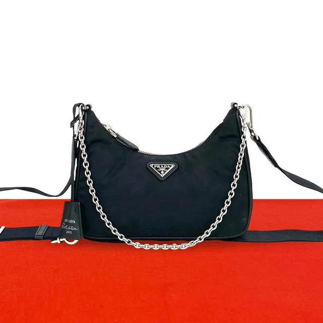 Prada Triangle Logo Tessuto Pocono Nylon Saffiano Leather Chain Shoulder Bag in Saffiano leather from The Reluxe