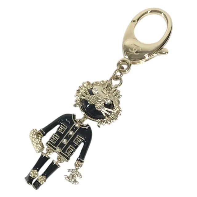 Chanel Key Holder Lion Camellia Logo Animal Rhinestone 22P Metal Black in Black from The Reluxe