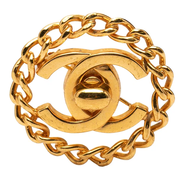 Gold Chanel Gold Plated CC Turnlock Chain Brooch in Gold from Designer Revival