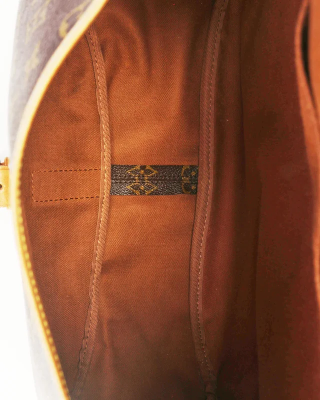 Louis Vuitton Monogram Saumur 35 Bag in Coated canvas from A Retro Tale, photo 9 of 11