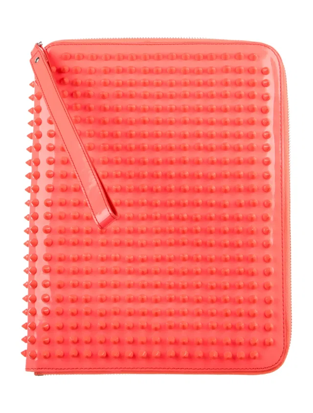 Christian Louboutin Spiked Tablet Carrying Case in pink Leather from The RealReal