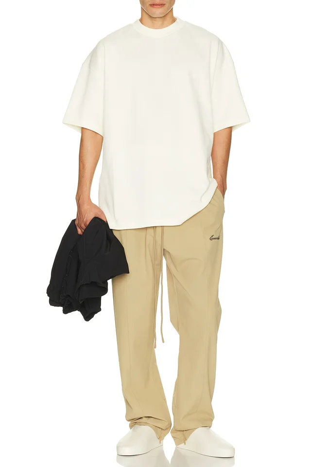 Fear of God ESSENTIALS Signature 90's Short Sleeve Tee in Ivory, photo 3 of 5 from REVOLVE (Canada)