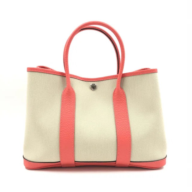 Hermès Elegant canvas and leather tote bag in Canvas from Luxury Promise