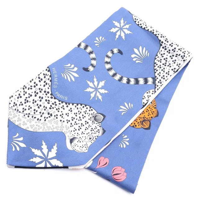Hermès les Leopards Maxi Twilly Twill Up Scarf Blue in Blue Silk from The Reluxe