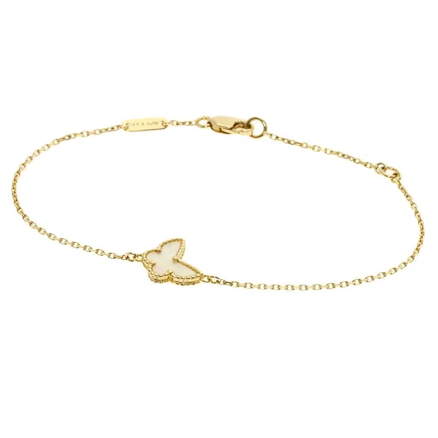Van Cleef & Arpels 18k Gold Papillon Charm Bracelet in gold from Poshmark
