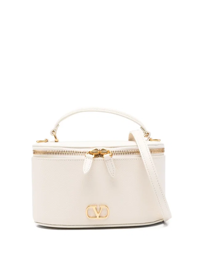 Valentino Garavani Cream Leather Vlogo Clutch — White in White Leather from HEWI