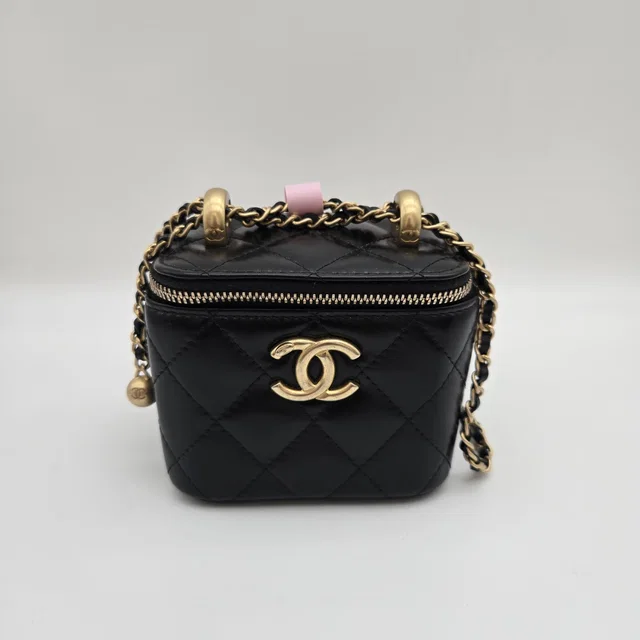 Chanel Black Quilted Mini Vanity Case in Black from Luxury Promise