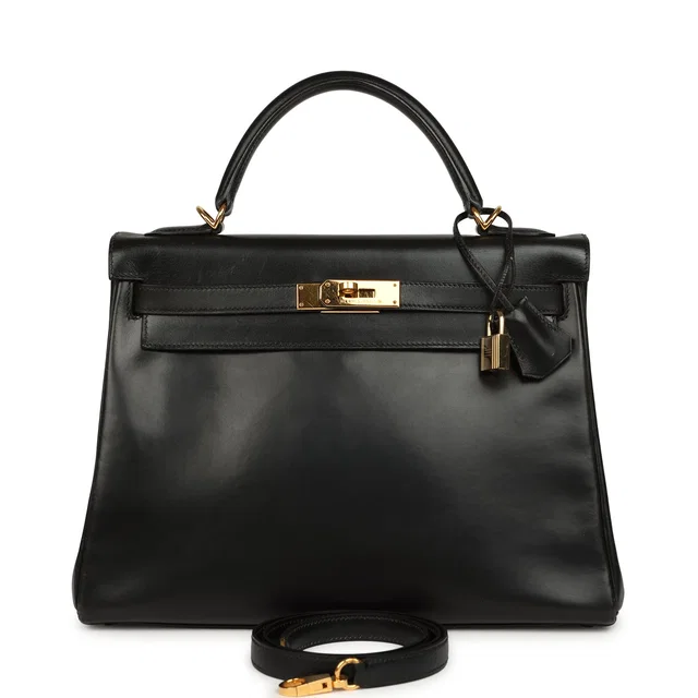 Hermès Vintage Kelly Retourne 32 Black Box Gold Hardware in Black Calfskin from Madison Avenue Couture