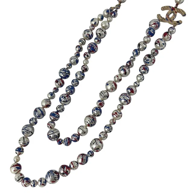Chanel Necklace CC Logo Long Paint Faux Pearl Gold in Gold from The Reluxe